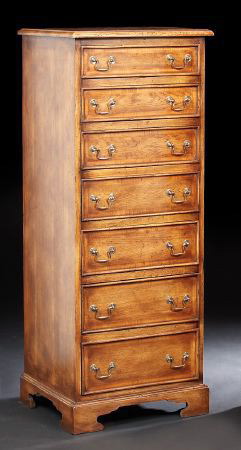 Appraisal: George III-Style Oak and Hardwood Semainier with a banded rectangular