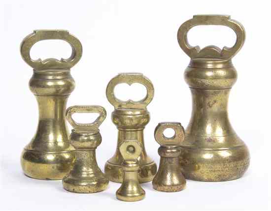 Appraisal: Six English Brass Weights each set with a ring handle