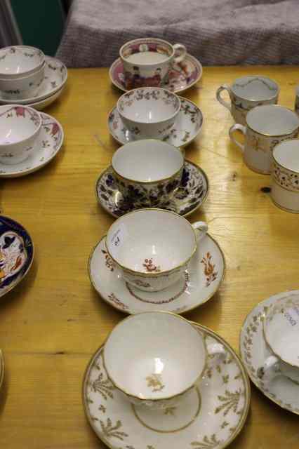 Appraisal: A PAIR OF ENGLISH PORCELAIN TEA CUPS and saucers circa