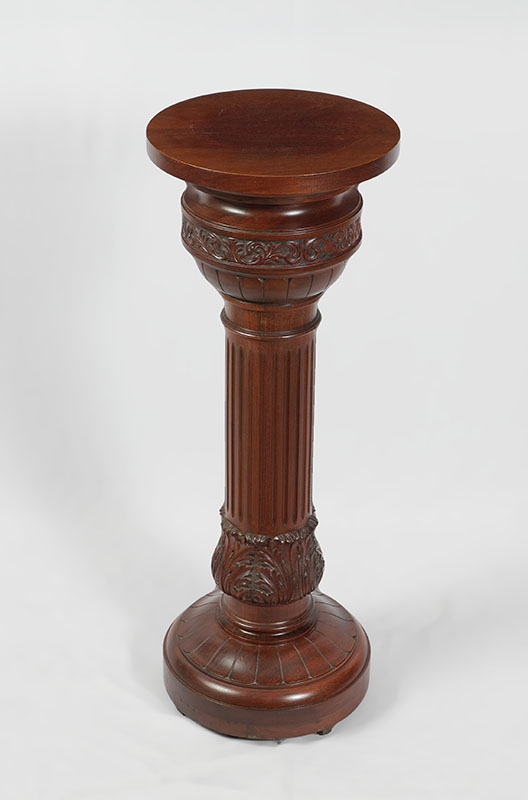 Appraisal: VICTORIAN CARVED MAHOGANY PEDESTAL Round top over foliate scroll motif