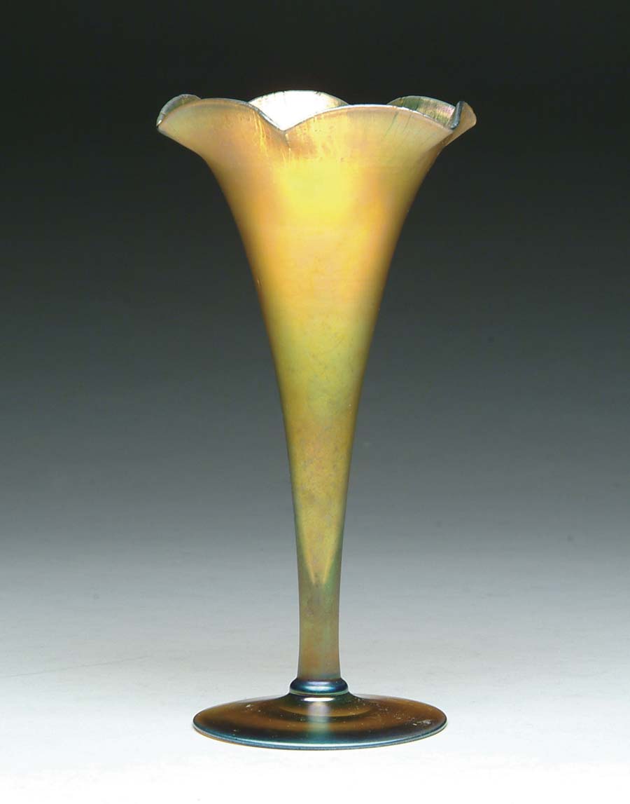 Appraisal: STEUBEN TRUMPET VASE Steuben trumpet vase features gold iridescent glass