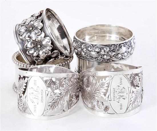 Appraisal: Sterling and silverplate napkin rings pair English sterling rings Unger