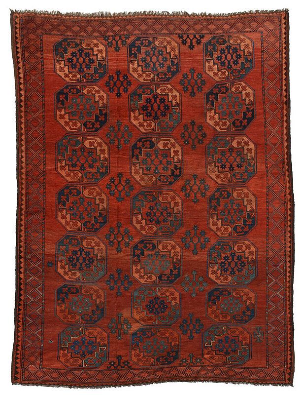 Appraisal: Afghan Carpet early th century red field with octagonal medallions