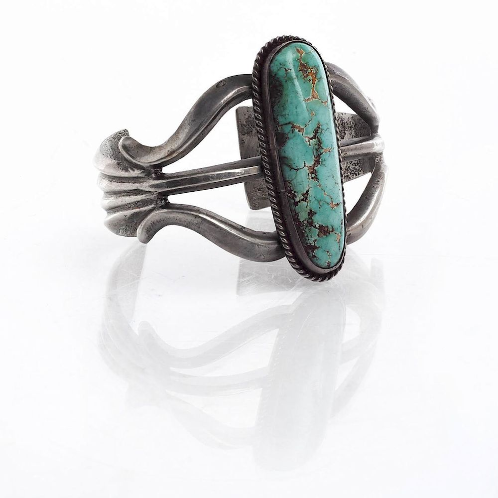 Appraisal: NATIVE AMERICAN TRIBAL TURQUOISE SILVER BRACELET Hallmarked silver turquoise is