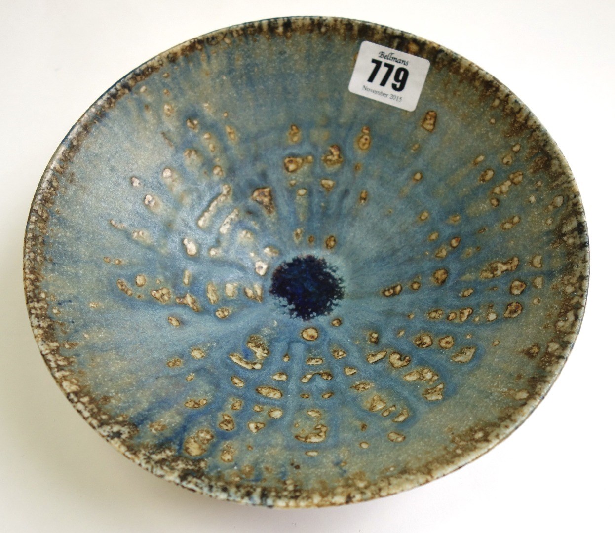 Appraisal: A Derek Davis pottery bowl 's decorated in mottled blues