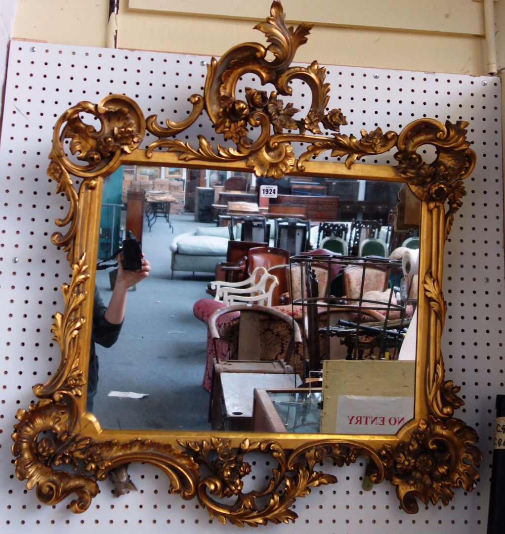 Appraisal: A Louis XV style gilt framed wall mirror with acanthus