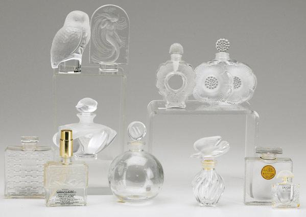 Appraisal: LALIQUE GROUPING Nine perfume bottles includes bird flower and figurals