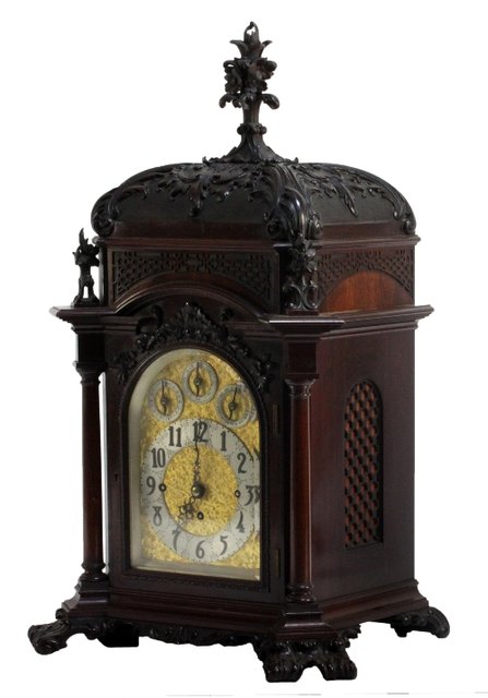 Appraisal: A mahogany bracket clock circa the arched brass dial with