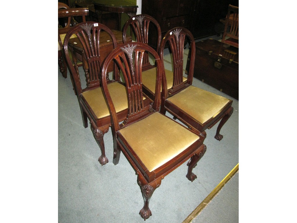 Appraisal: Set of four reproduction wheatsheaf splatback dining chairs on ball