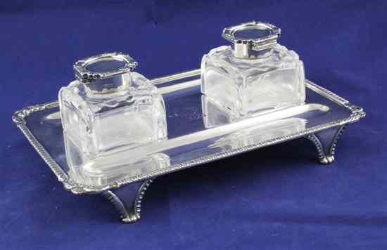 Appraisal: A George V silver rectangular inkstand with gadrooned and shell