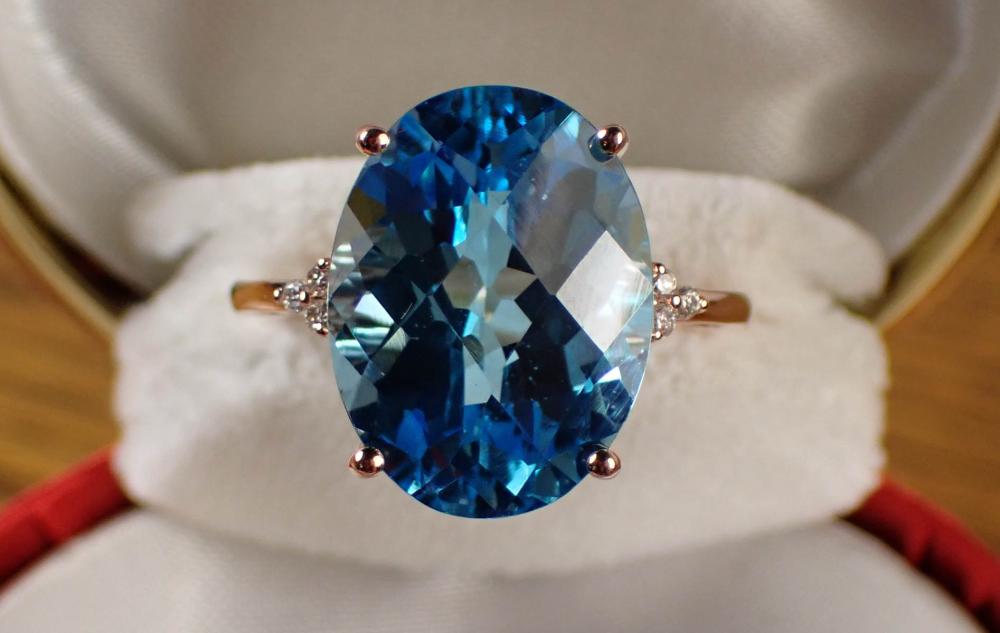 Appraisal: BLUE TOPAZ DIAMOND AND FOURTEEN KARAT GOLD RING The k