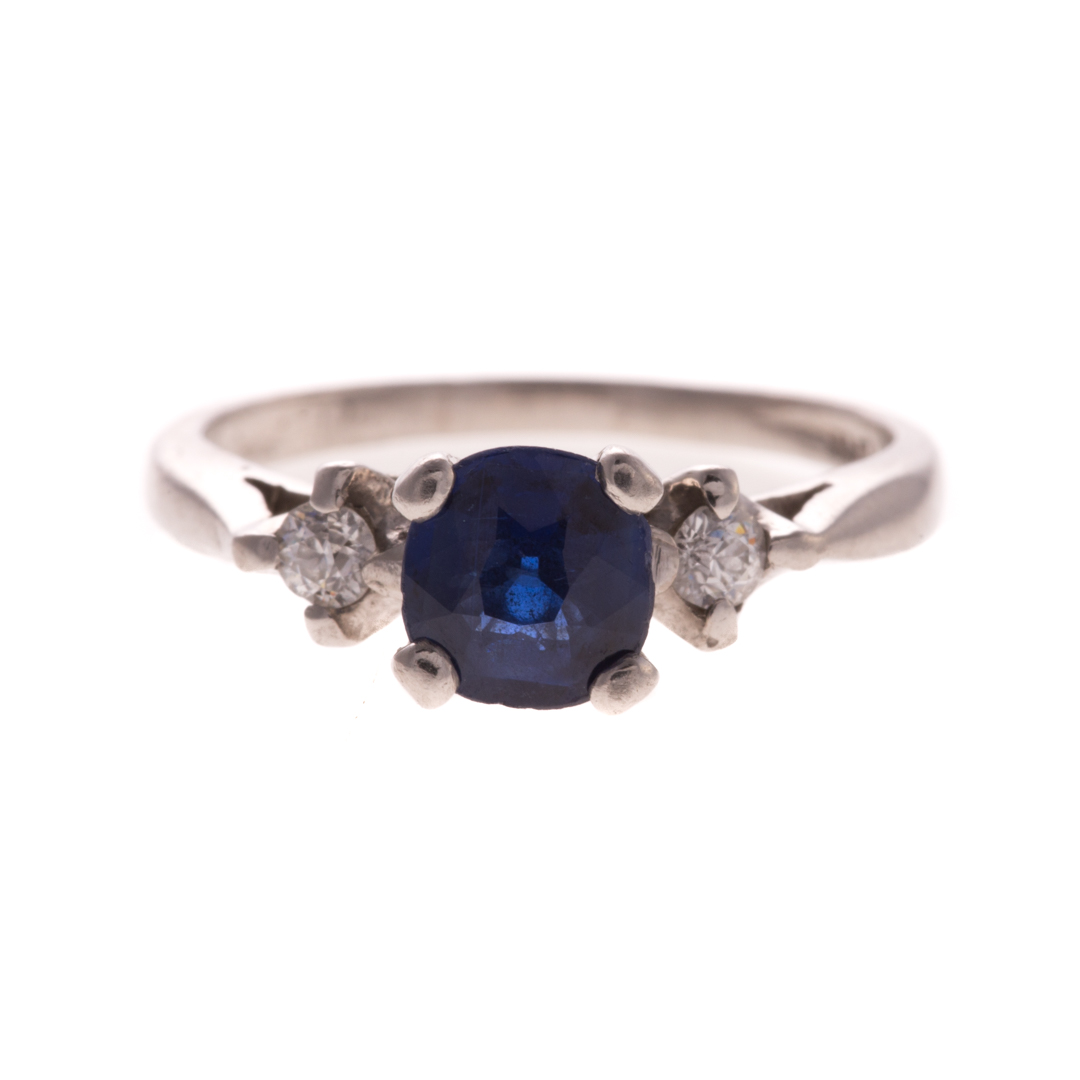 Appraisal: A Lady's Platinum Sapphire and Diamond Ring Platinum ring featuring