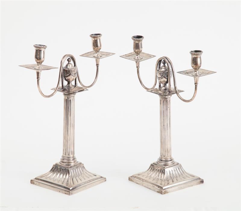 Appraisal: PAIR OF CONTINENTAL SILVER TWO-LIGHT CANDELABRA With two punch marks