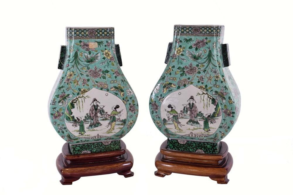 Appraisal: PAIR OF CHINESE KANGXI FAMILLE VERTE HU-FORM VASESThe underside marked