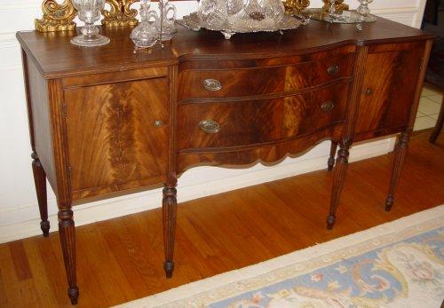 Appraisal: SHERATON STYLE MAHOGANY SIDEBOARD Swell front with drawers flanked by