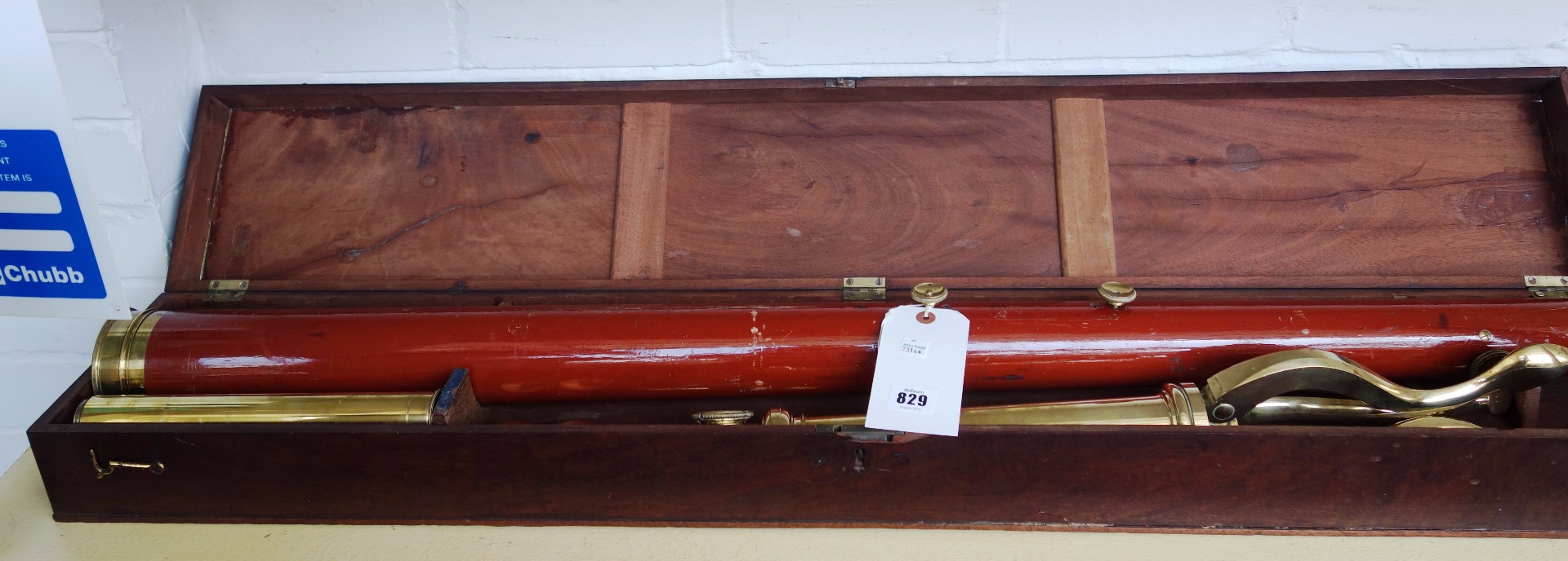 Appraisal: A three inch Dollond brass and mahogany refracting telescope on