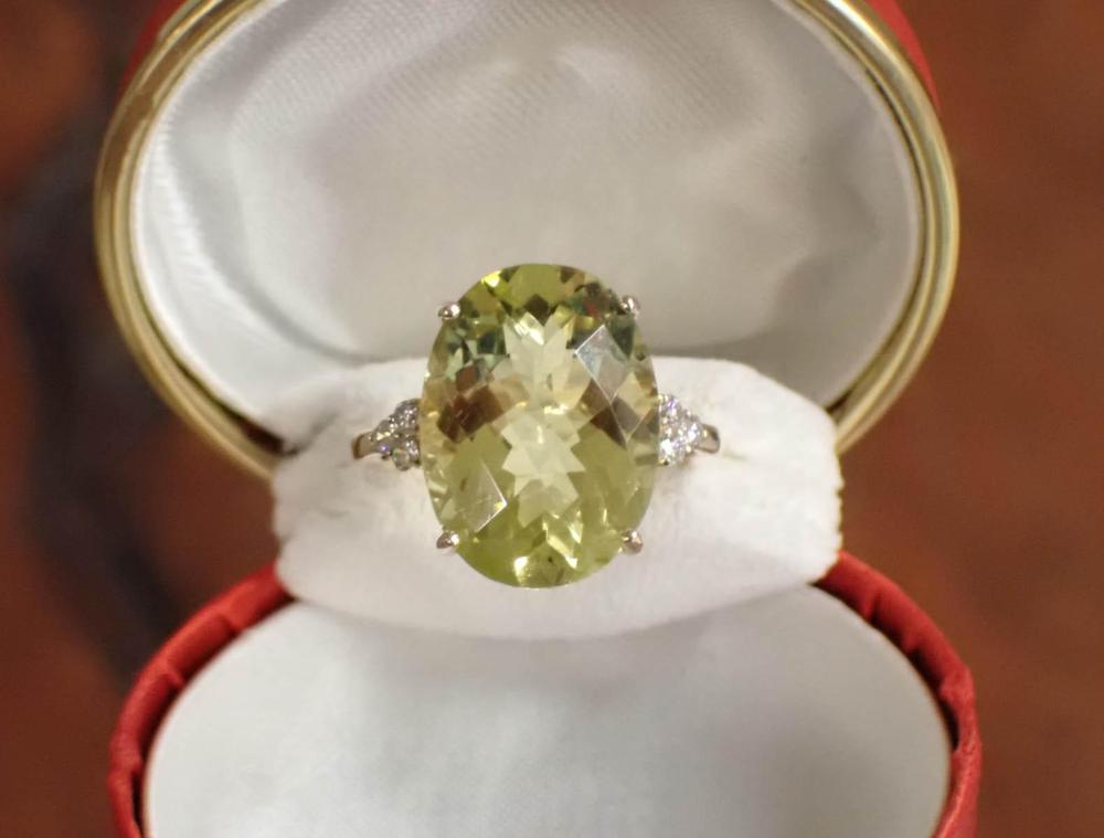 Appraisal: LEMON QUARTZ DIAMOND AND FOURTEEN KARAT GOLD RING The yellow