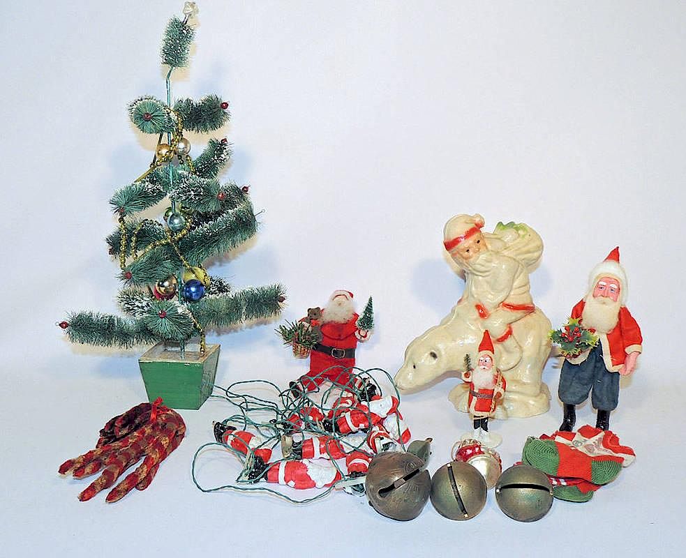 Appraisal: Group of Christmas Items To include a paper-mach Santa riding