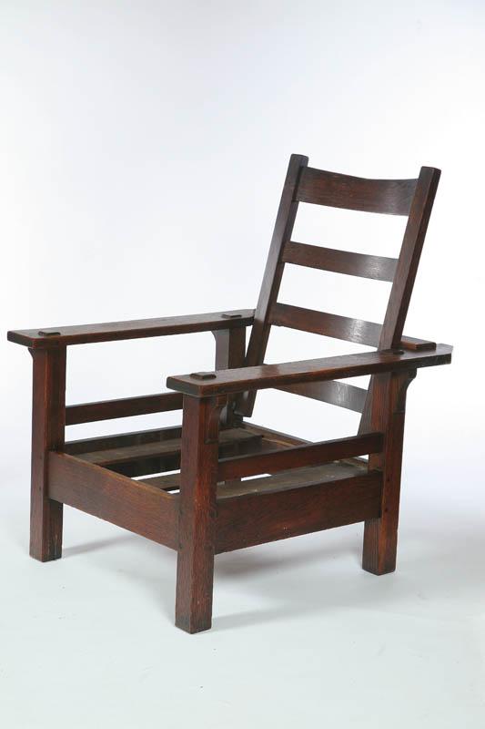 Appraisal: ARTS CRAFTS MORRIS CHAIR American early th century oak Wide