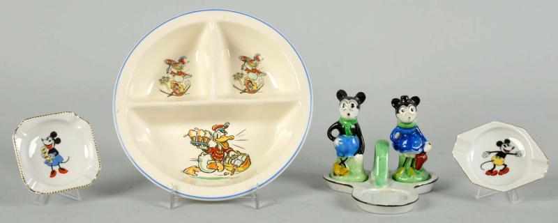 Appraisal: Lot of Walt Disney Character Pieces Description Includes one Mickey