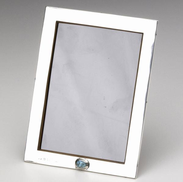 Appraisal: LIBERTY CO Cymric sterling silver picture frame with turquoise cabochon