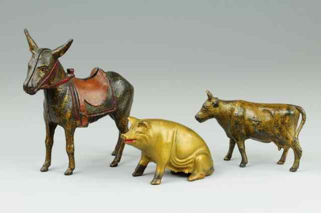 Appraisal: LOT OF FARM ANIMAL STILL BANKS Cast iron includes gold