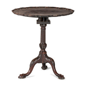 Appraisal: A Chippendale Carved and Figured Mahogany Pie-Crust Tilt-Top Tea Table