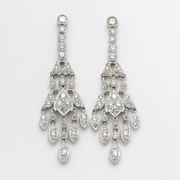 Appraisal: A pair of diamond pendant earrings estimated total diamond weight