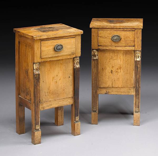 Appraisal: A pair of Italian Neoclassical parcel gilt walnut commodini early