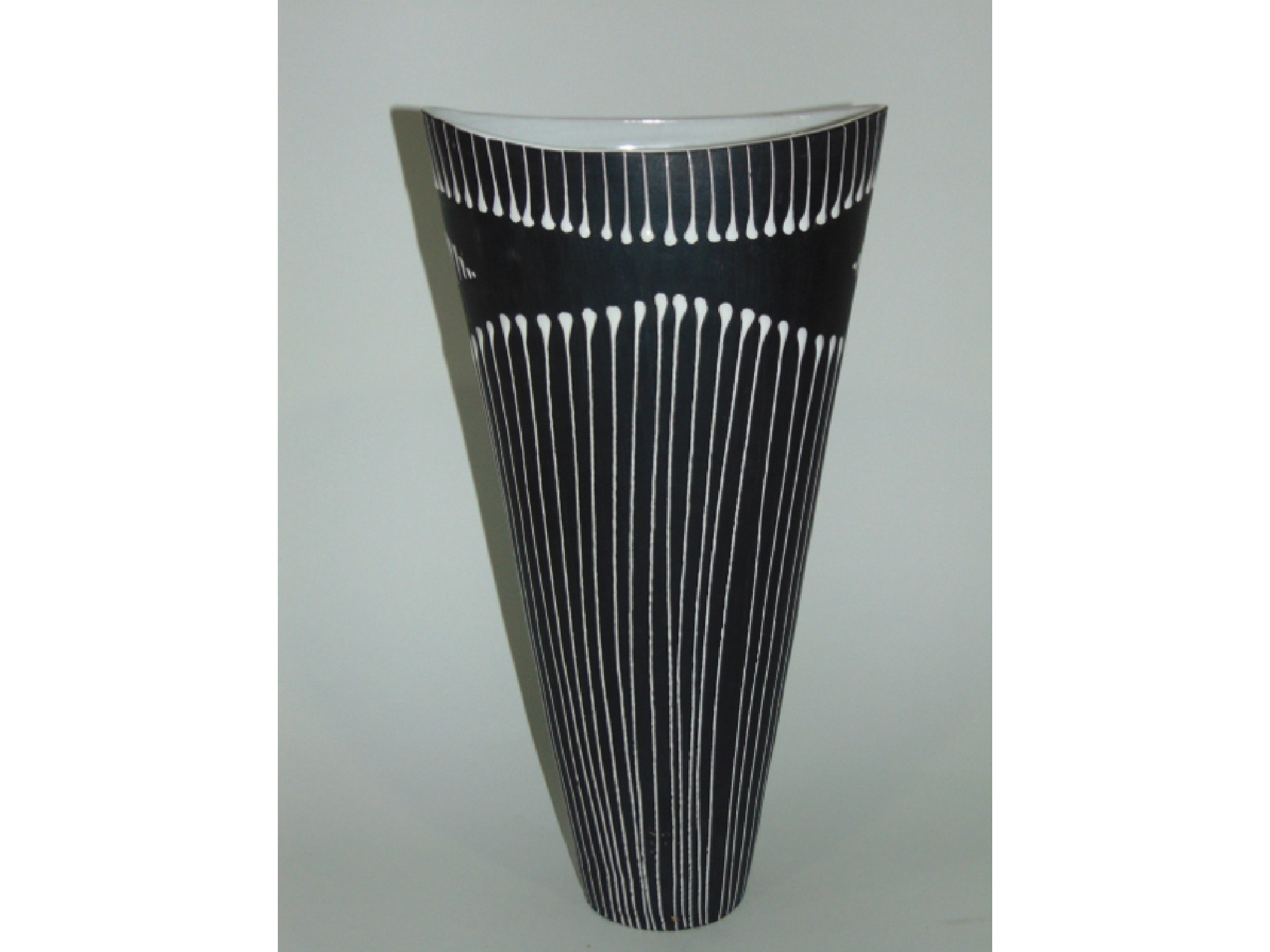 Appraisal: An unusual black ground Norwegian vase with white trailed line