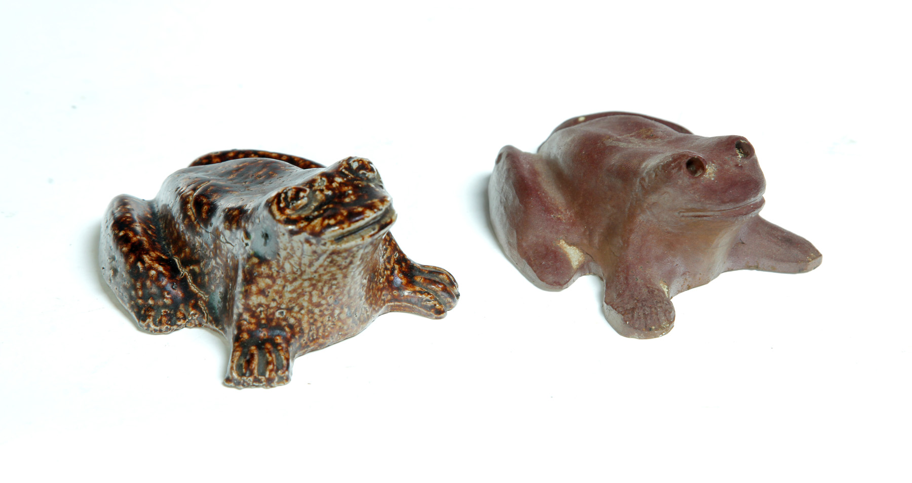 Appraisal: TWO AMERICAN SEWERTILE FROGS Twentieth century Glazed and unglazed initialed