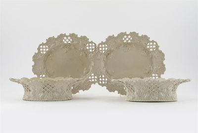 Appraisal: A pair of white salt-glazed stoneware baskets and stands moulded