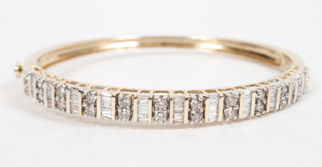 Appraisal: Lady's K gold and diamond bangle bracelet the top with