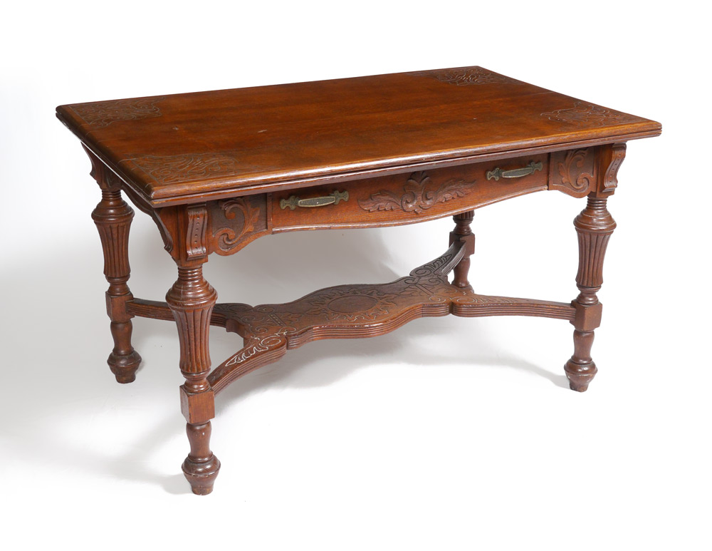 Appraisal: VICTORIAN CARVED OAK WRITING TABLE Top with carved foliate design