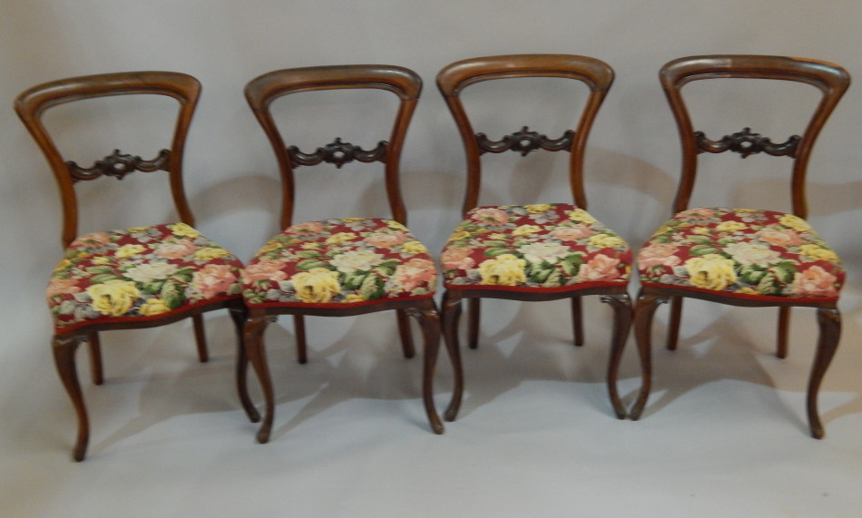 Appraisal: A set of four early Victorian rosewood balloon back chairs