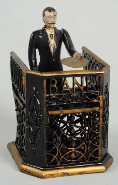 Appraisal: Cast Iron Bank Teller Mechanical Bank Manufactured by J E