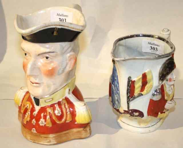 Appraisal: A TH CENTURY STAFFORDSHIRE TOBY JUG in the form of