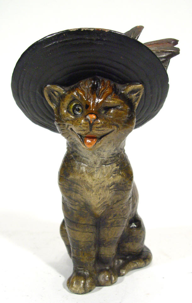 Appraisal: Louis Wain design pottery cat with beaded glass eyes and