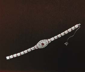 Appraisal: PLATINUM RUBY AND DIAMOND BRACELET Flexible platinum filigree bracelet set