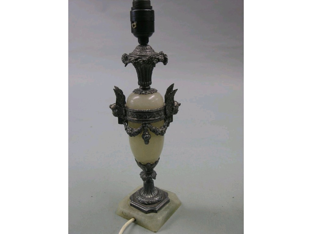 Appraisal: An alabaster table lamp with elaborate silver plated mounts together