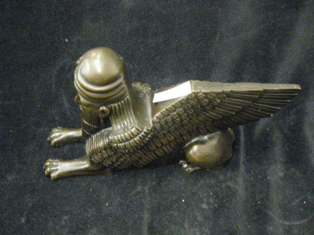 Appraisal: Art Deco Bronze Figure of a Winged Lion tall long