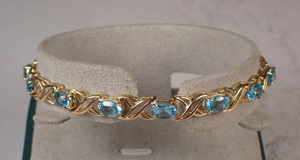 Appraisal: BLUE TOPAZ AND FOURTEEN KARAT GOLD BRACELET The - yellow