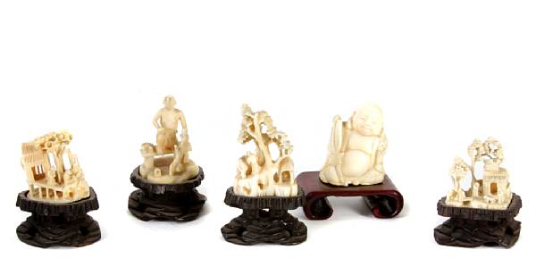 Appraisal: A group of eight miniature Chinese carvings including three Buddhas