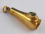 Appraisal: A Russian gold cigar cutter with green hardstone thumbpiece Bears