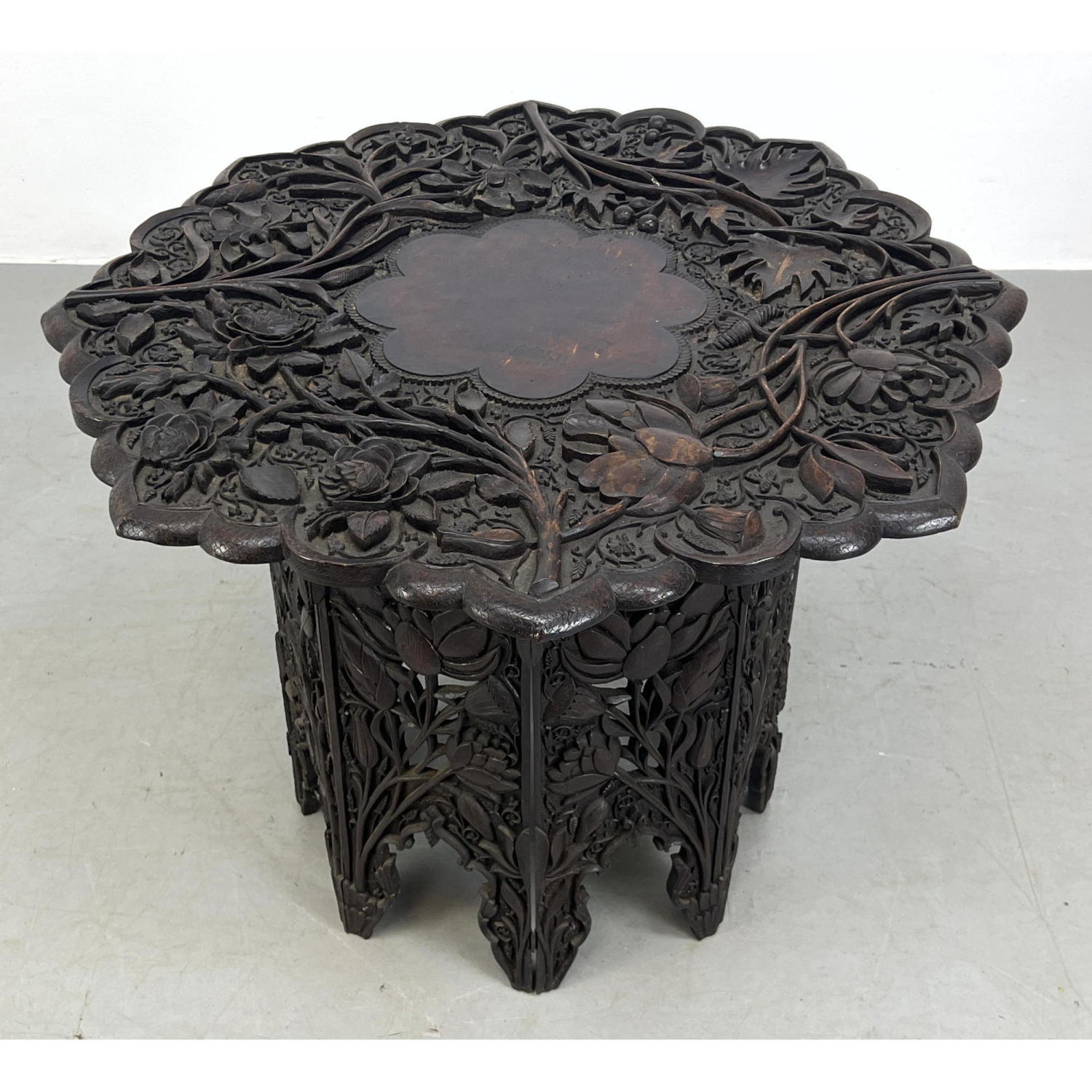 Appraisal: JUBBAR KAHN and Sons Heavily Carved Table with Collapsable Base