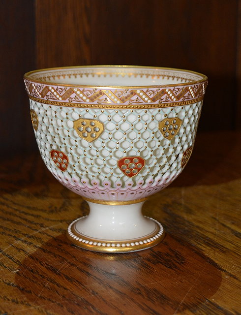 Appraisal: A Royal Worcester reticulated vase in the manner of George