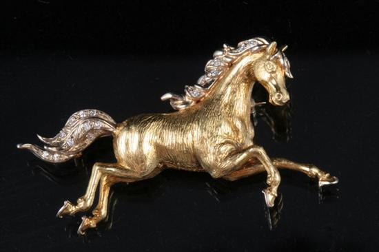 Appraisal: K YELLOW AND WHITE GOLD AND DIAMOND GALLOPING HORSE PIN