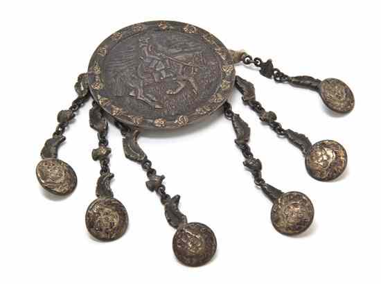 Appraisal: An Argentinian Silver Vest Chatelaine the central medallion with equestrian