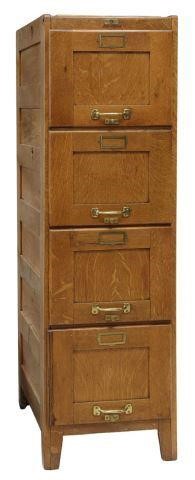 Appraisal: American oak file cabinet early th c four drawers rising