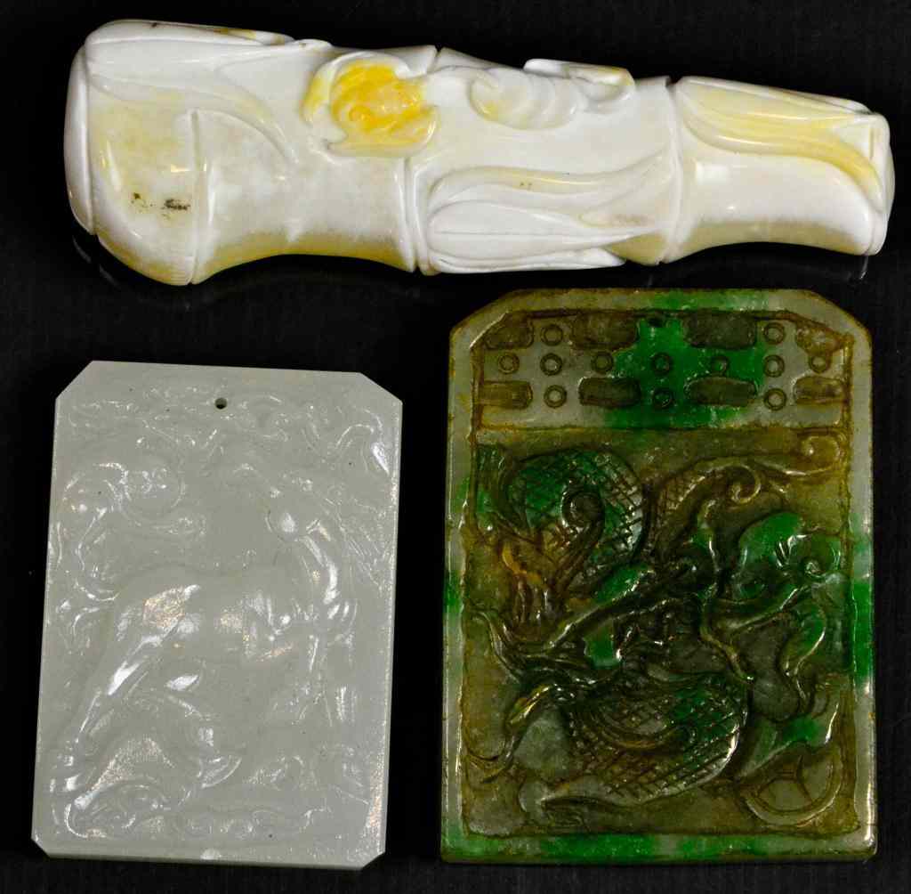 Appraisal: Chinese Carved Jade ItemsTo include a carved jade double-sided Cui